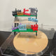Our vinyl charms stand!