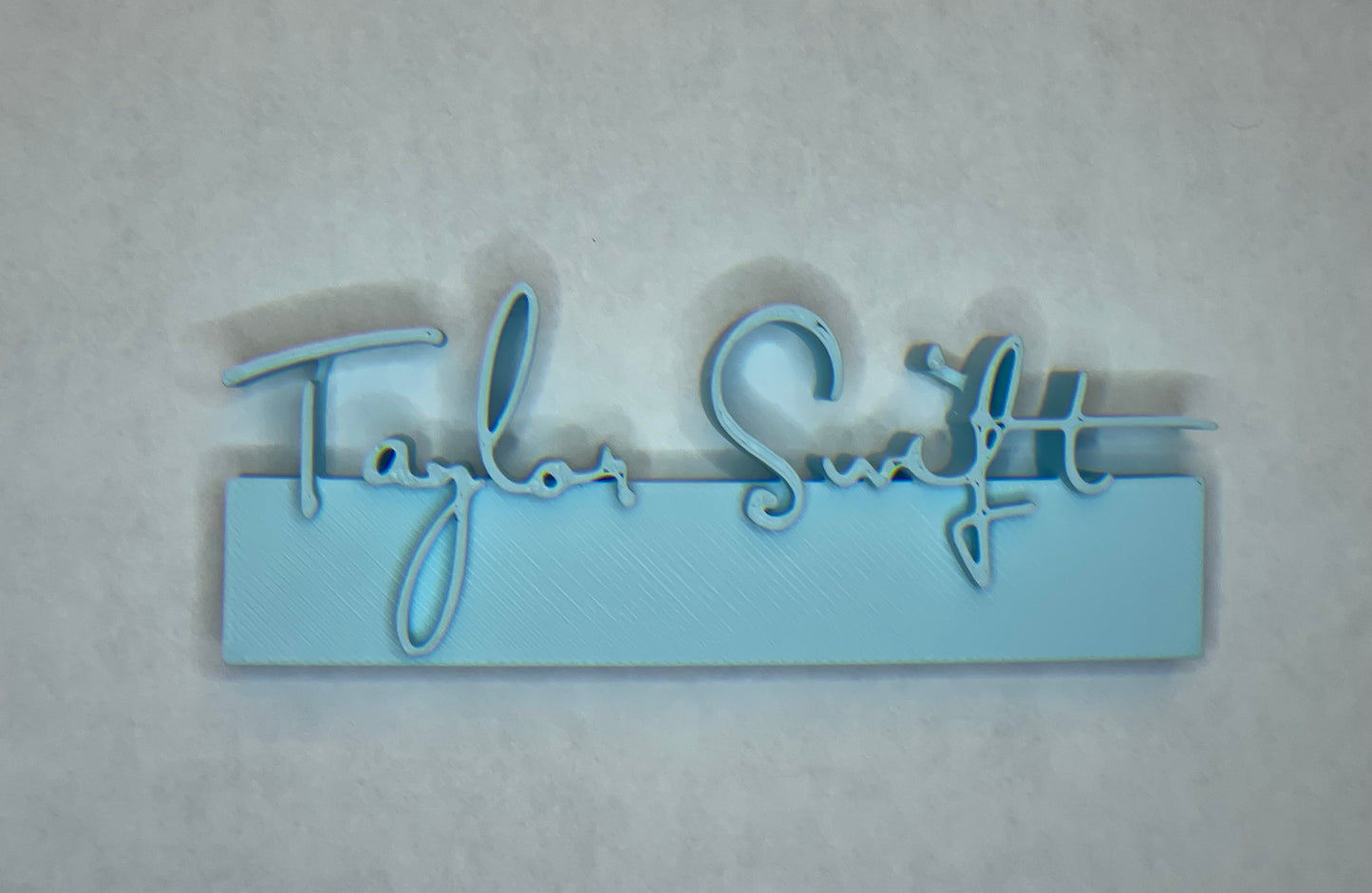 Debut charm for record collectors or accessorizing Taylor Swifties