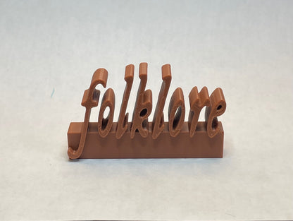 Folklore charm for record collectors or accessorizing Swifties