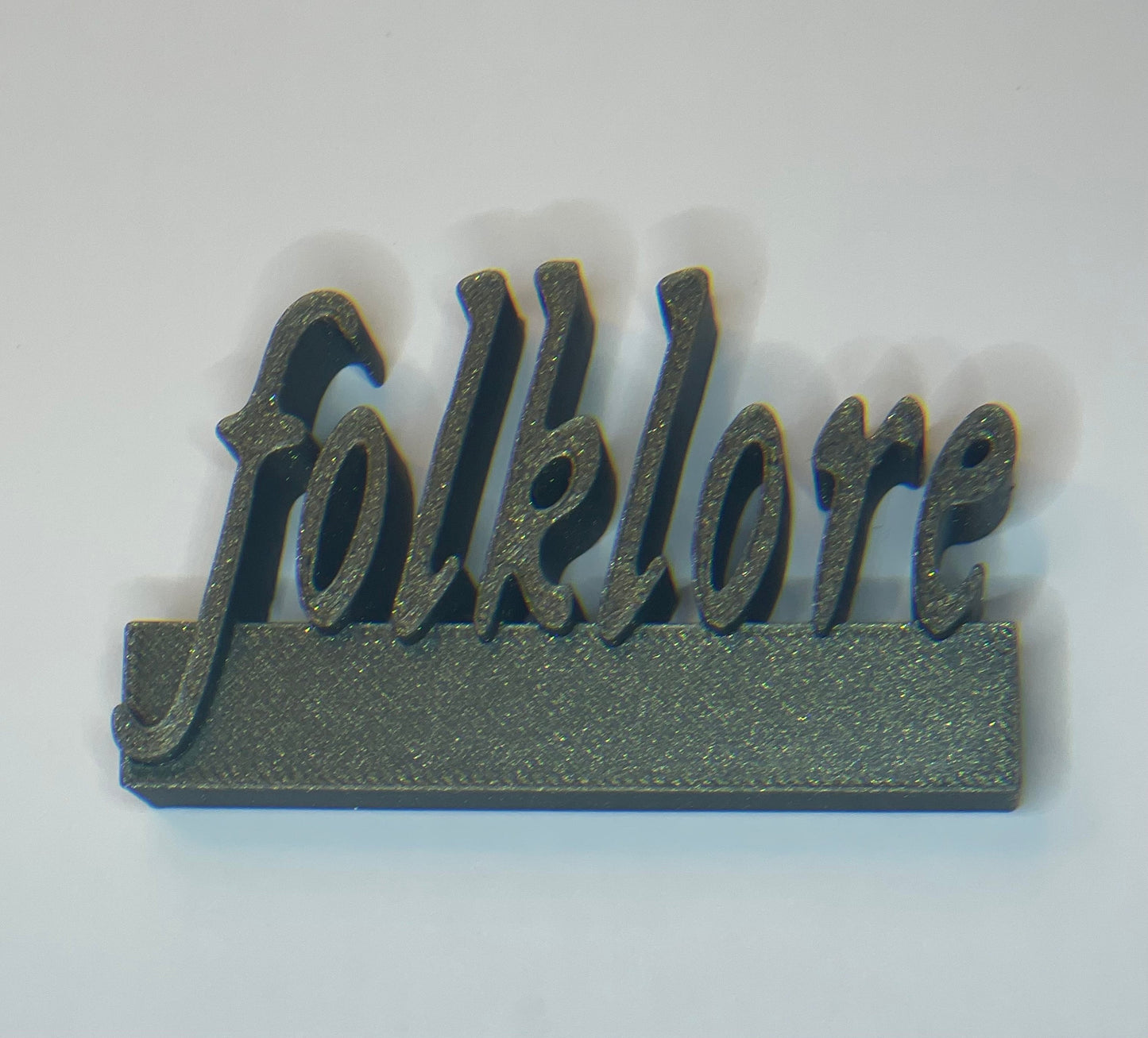 Folklore charm for record collectors or accessorizing Swifties