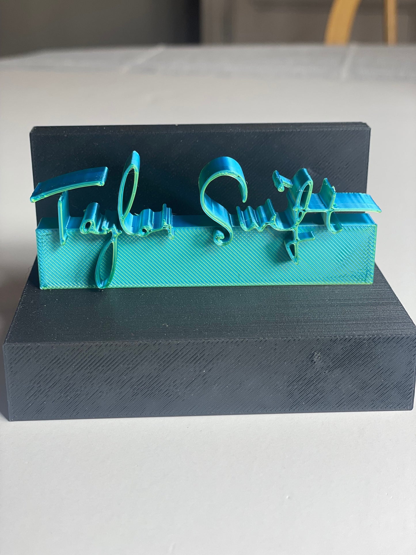 Debut charm for record collectors or accessorizing Taylor Swifties