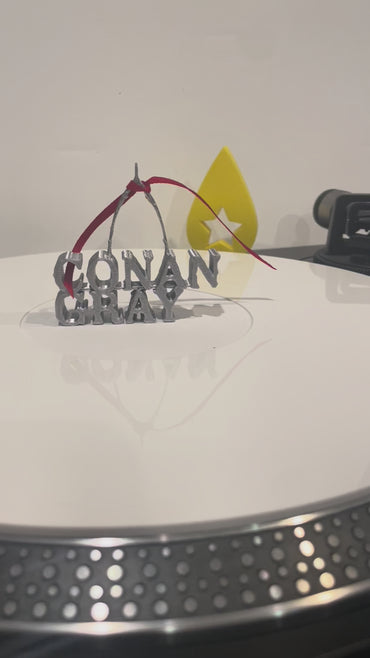Conan Gray charms